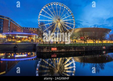 Liverpool big Ferris wheel and arena at night. Stock Photo