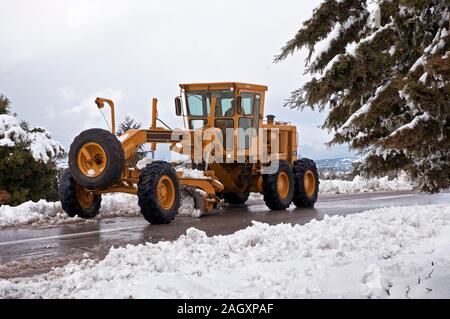 Snow removing Tractor Stock Photo