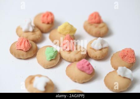 Belly button iced gem biscuits on white background Stock Photo