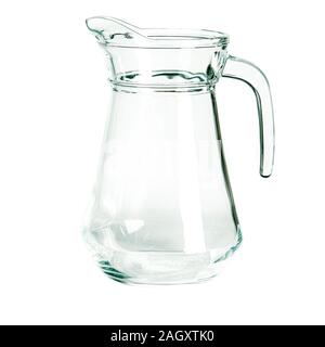 An empty glass glass and a carafe for water stand on a white background Stock Photo
