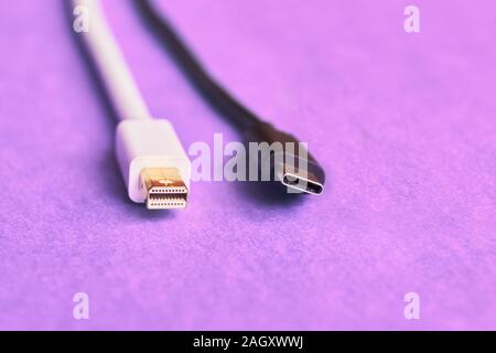 Closeup of HDMI cable. Cable on the pink table. Stock Photo