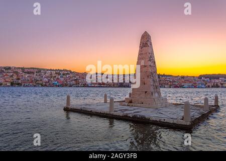 Beautiful panoramic view of the city at sunset and an Obelisk monument in Greek town Argostoli on Kefalonia island (Ionian island) in Greece. Stock Photo