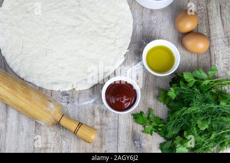 Pizza ingredients on yellow background Stock Photo