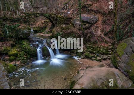 The Schiessentümpel is a small and picturesque waterfall on the Black Ernz river. Mullerthal - Luxembourg’s Little Switzerland. Stock Photo