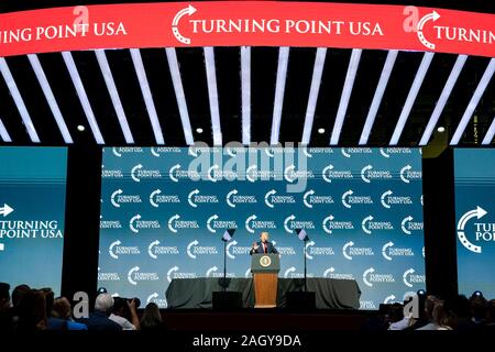 U.S President Donald Trump delivers remarks at the Turning Point USA 5th annual Student Action Summit at the Palm Beach County Convention Center December 21, 2019 in West Palm Beach, Florida. Trump rallied the youth conservative group with wild claims on wind turbines and attacks on his opponents. Stock Photo