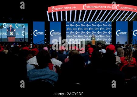 U.S President Donald Trump delivers remarks at the Turning Point USA 5th annual Student Action Summit at the Palm Beach County Convention Center December 21, 2019 in West Palm Beach, Florida. Trump rallied the youth conservative group with wild claims on wind turbines and attacks on his opponents. Stock Photo