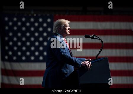 U.S President Donald Trump delivers remarks at the Turning Point USA 5th annual Student Action Summit at the Palm Beach County Convention Center December 21, 2019 in West Palm Beach, Florida. Trump rallied the youth conservative group with wild claims on wind turbines and attacks on his opponents. Stock Photo