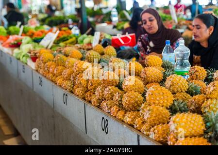 FIJI - JULY 12, 2019: Pineapples on the counter. With selective focus Stock Photo