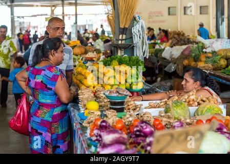 FIJI - JULY 12, 2019: People in the local market. With selective focus Stock Photo