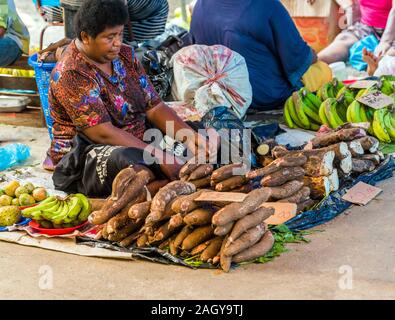 FIJI - JULY 12, 2019: Woman sells vegetables at the local market Stock Photo