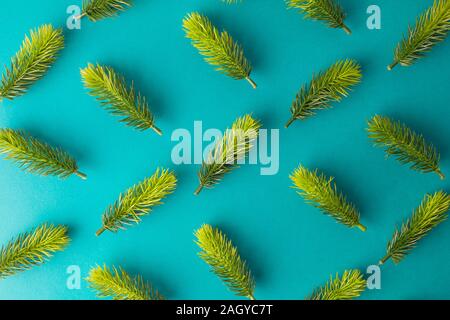 Background pattern made of fir tree branches minimal christmas holiday creative concept. Stock Photo