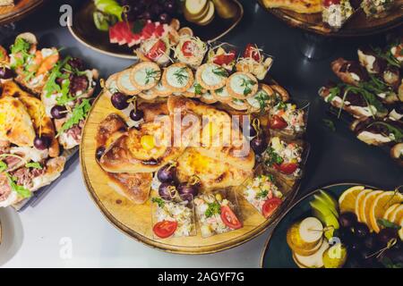 Assorted Chinese food set. Chinese noodles, fried rice, dumplings, peking duck, dim sum, spring rolls. Famous Chinese cuisine dishes on table. Top vie Stock Photo