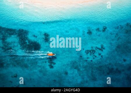 Aerial view of the fishing boats in clear blue water Stock Photo