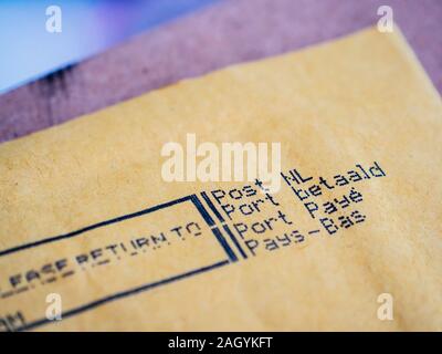 Amsterdam, Netherlands - Aug 9, 2017: Close-up macro Detail of business envelope from Post NL Netherlands Port Payepostal service with Prioritaire stamp printed on dot matrix printer Stock Photo