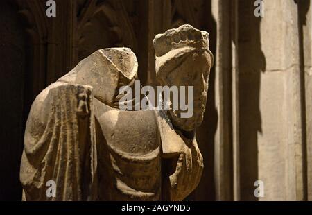 The statue of St Cuthbert in the shrine of St Cuthbert in Durham Cathedral was beheaded during the reformation in 16th Century by religious extremists Stock Photo