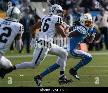 Carson, United States. 22nd Dec, 2019. Los Angeles Chargers' receiver Andre  Patton is tackled by Oakland Raiders Will Compton (51) in second quarter  action at Dignity Health Sports Park in Carson, California