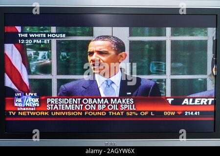 Miami Beach Florida,television,set,TV,flat panel,screen,monitor,cable channel,Fox News Channel,Obama,BP oil spill,visitors travel traveling tour touri Stock Photo