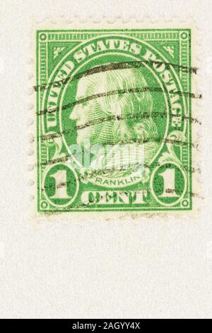Green 1 cent USA postage stamp featuring Benjamin Franklin, the first Postmaster General. Issued 1922-34. Portrait profile with copy space. Stock Photo