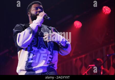 Sunrise, United States. 22nd Dec, 2019. Khalid performs at the Y100 IHeartRadio Jingle Ball 2019 concert at the BB&T Center in Sunrise, Florida, on Sunday, December 22, 2019. Photo by Gary I Rothstein/UPI Credit: UPI/Alamy Live News Stock Photo