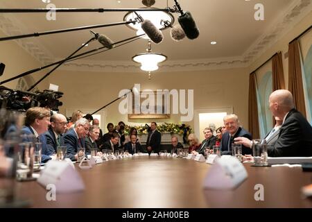Washington, United States Of America. 16th Dec, 2019. President Donald J. Trump, joined by Vice President Mike Pence, participates in a roundtable discussion on the GovernorsÕ Initiative on Regulatory Innovation Monday, Dec. 16, 2019, in the Cabinet Room of the White House. People: President Donald Trump, Vice President Mike Pence Credit: Storms Media Group/Alamy Live News Stock Photo