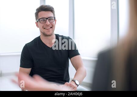 friendly interviewer welcomed guest in the Studio. Stock Photo