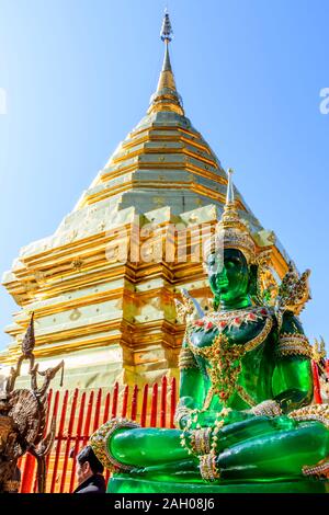 Chiang Mai, Thailand - December 10, 2019: Emerald Buddha & pagoda at Wat Phra That Doi Suthep a Buddhist temple & famous tourist destination Stock Photo