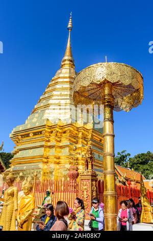 Chiang Mai, Thailand - December 10, 2019: Tourists & pagoda at Wat Phra That Doi Suthep a Buddhist temple & famous tourist destination