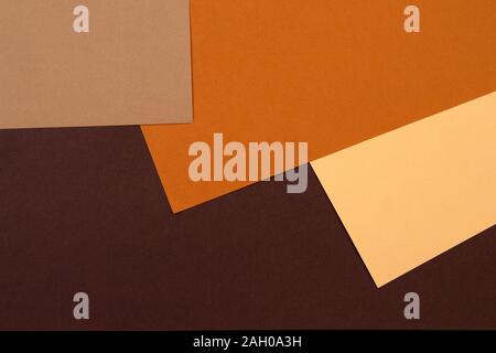 Abstract geometric paper background in earth tone. Many earth tones originate from clay earth pigments, such as umber, ochre, and sienna. Stock Photo