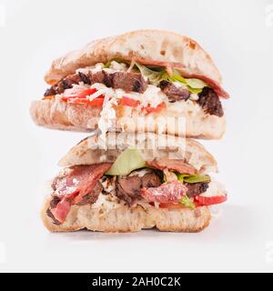 A two piece steak sandwich Stock Photo
