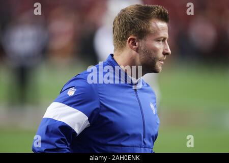 Santa Clara, California, USA. 21st Dec, 2019. Los Angeles Rams quarterback  Jared Goff (16) passes under pressure from San Francisco 49ers defensive  end Nick Bosa (97) during the NFL game between the