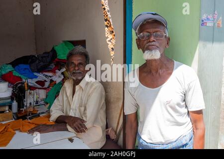 Portrait of senior men in tailor shop, Trichy, Tamil Nadu, India Stock Photo