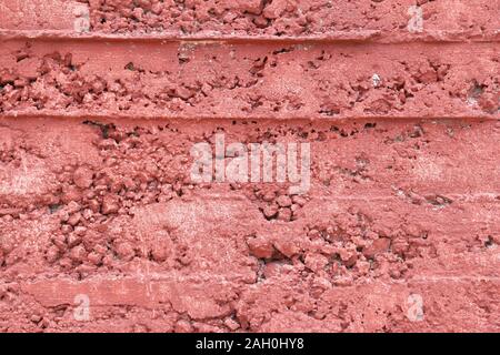 Red grunge wall background. Froly colored texture. Stock Photo