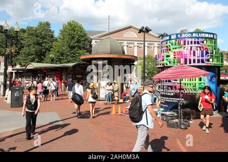 CAMBRIDGE, USA - JUNE 9, 2013: People visit downtown Cambridge, MA. Cambridge is a large town in Boston Metropolitan Area, known for Harvard Universit Stock Photo