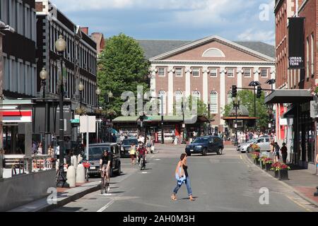 CAMBRIDGE, USA - JUNE 9, 2013: People visit downtown Cambridge, MA. Cambridge is a large town in Boston Metropolitan Area, known for Harvard Universit Stock Photo