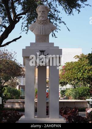 MINDELO, CAPE VERDE on APRIL 2019: Monument of Sa da Baneira at Praca Nova square, called Amilcar Cabral in african city at Sao Vicente island, clear Stock Photo