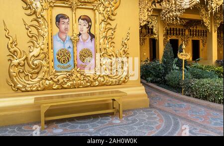 Chiang Rai, Thailand - February 21, 2017: extraordinary public golden toilet at Wat Rong Khun (White Temple) in Chiang Rai province, Thailand. Golden Stock Photo