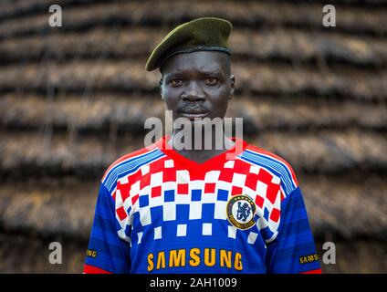 Portrait of a former soldier from Larim tribe wearing a chelsea football shirt, Boya Mountains, Imatong, South Sudan Stock Photo