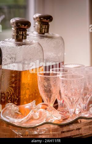 A tray of glasses and decanters. Stock Photo