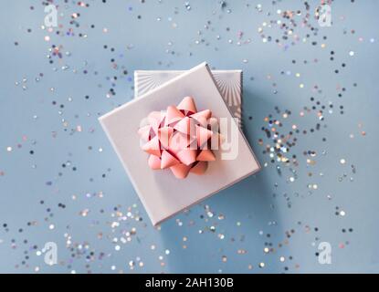 Gift boxes on blue background. Stock Photo