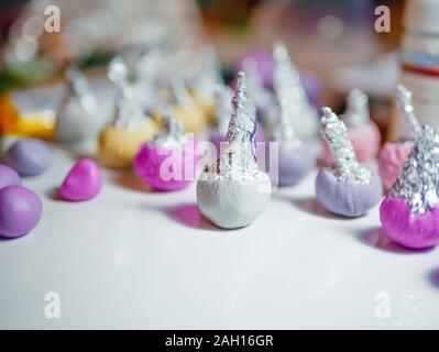 Few buds of polymer clay on the table for handmade craft in the home workplace Stock Photo