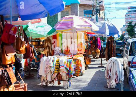 ASUNCION, PARAGUAY - JUNE 24, 2019: Sale of clothing and souvenirs in the local market Stock Photo