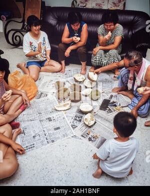 A family durian fruit feast, Malaysia Stock Photo