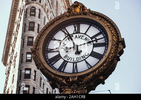 New York City - USA - JAN 30 2019: Fifth Avenue Building Clock in Flatiron District at early morning Stock Photo