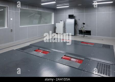 Empty can inspection room. Clean vehicle repair workshop interior. Automobile service space Stock Photo