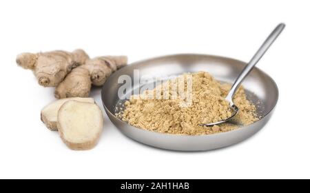 Some Powdered Ginger isolated on white (selective focus) Stock Photo