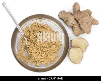 Some Powdered Ginger isolated on white (selective focus) Stock Photo