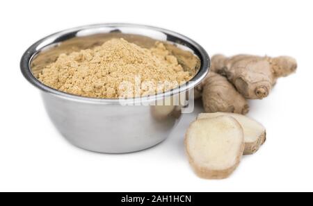 Some Powdered Ginger isolated on white (selective focus) Stock Photo