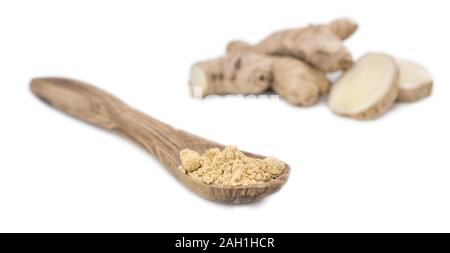 Some Powdered Ginger isolated on white (selective focus) Stock Photo