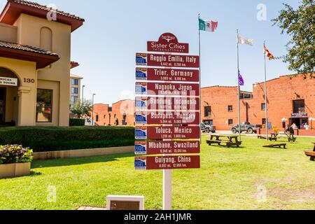 A road sign of sister cities of Fort worth, at the Fort Worth Stockyards, a historic district that is located in Fort Worth, Texas, USA. Stock Photo