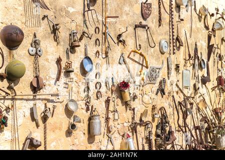 Tool Wall hanging on a pegboard wall. Stock Photo